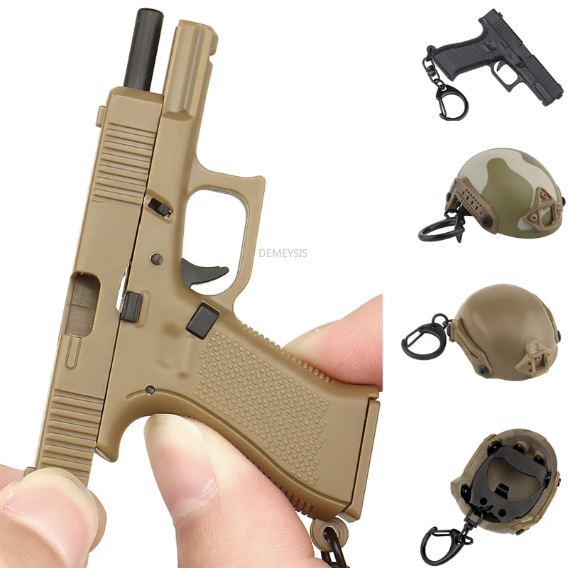 Photography Magazine - Mini chaveiro em forma de pistola
